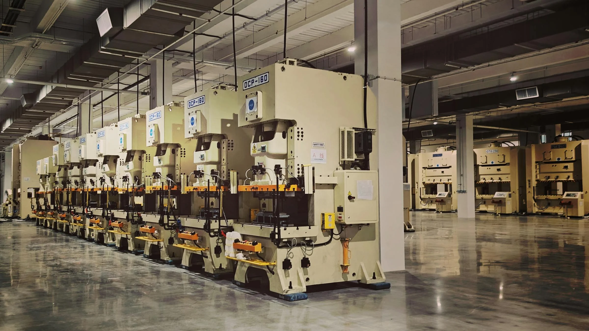 Automated factory production line with industrial machinery